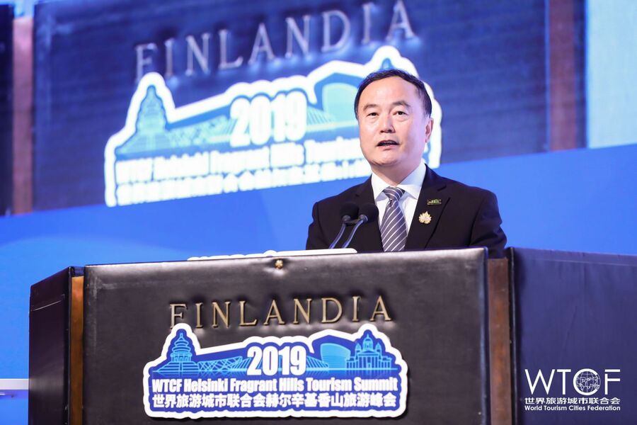 Mr. Song Yu, Secretary-General of WTCF delivers a speech 

				Album of Helsinki Fragrant Hills Tourism Summit			